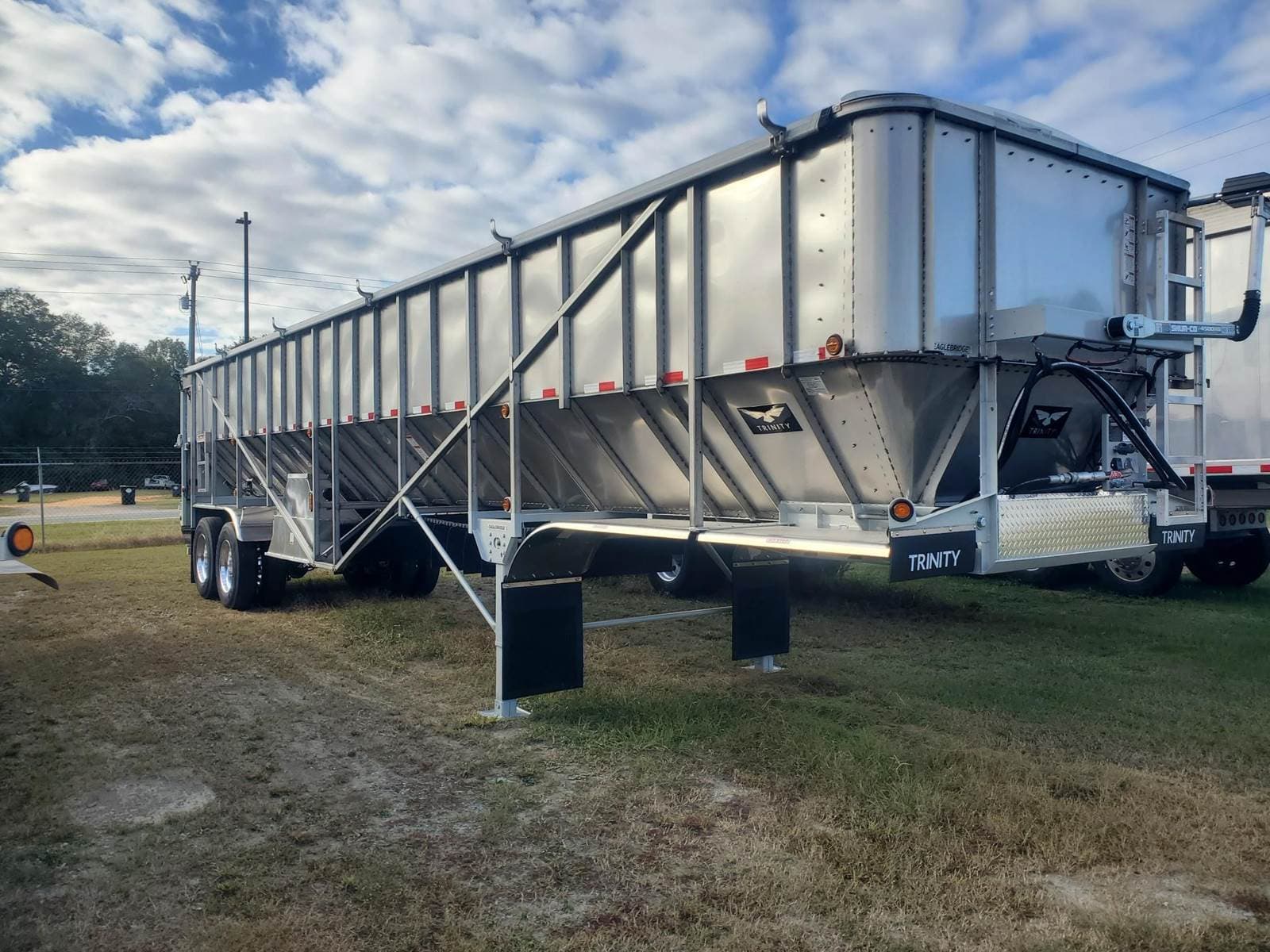 2026 Trinity 42x96 Tandem Axle Stainless Steel Belt Trailer - Air Ride, Fixed Axle
